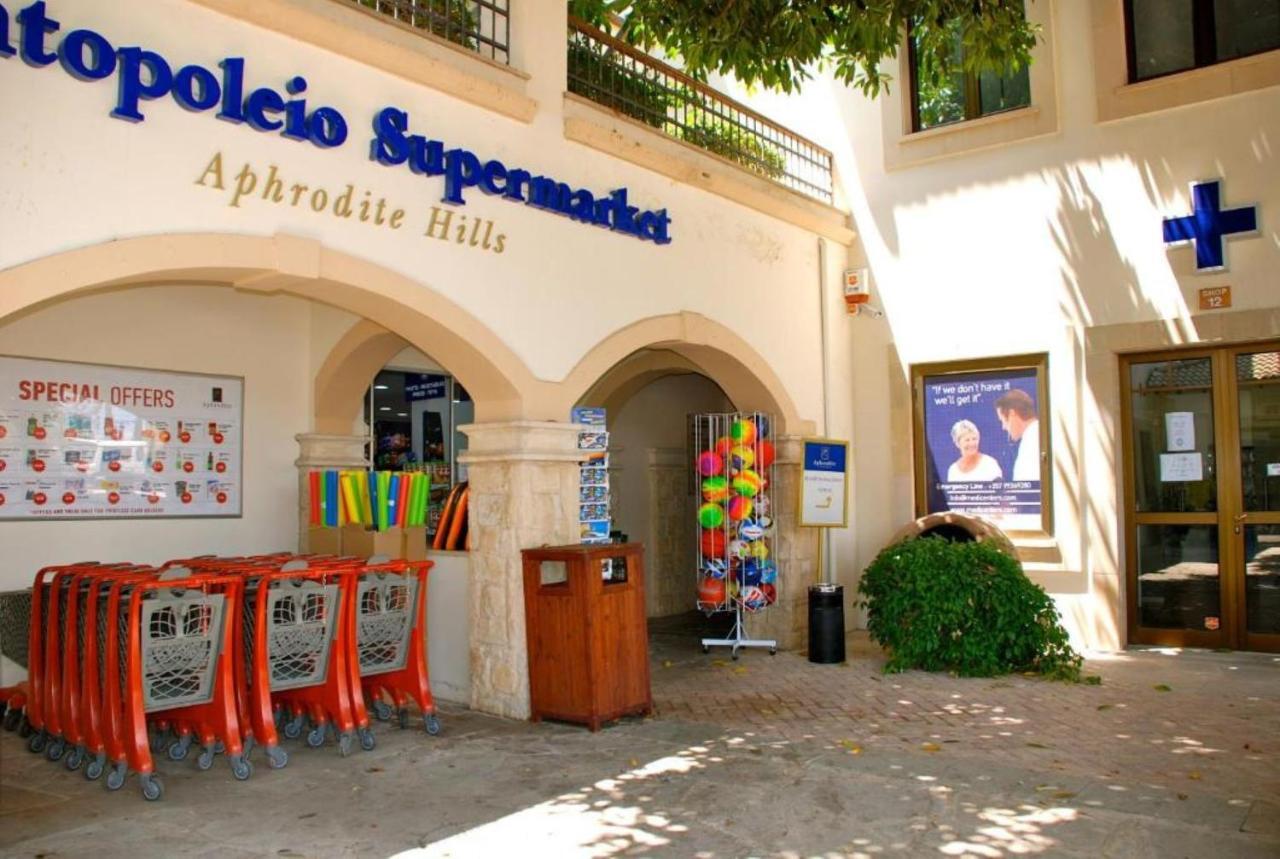 2 Bedroom Apartment Assia With Communal Pool, Aphrodite Hills Resort Куклия Экстерьер фото